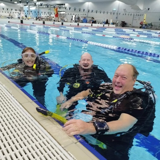 Ashley with his fellow students during a pool training session